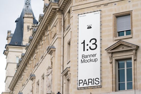 Vertical banner mockup on classic building facade, Parisian architecture, outdoor advertising space display, for graphic designers.